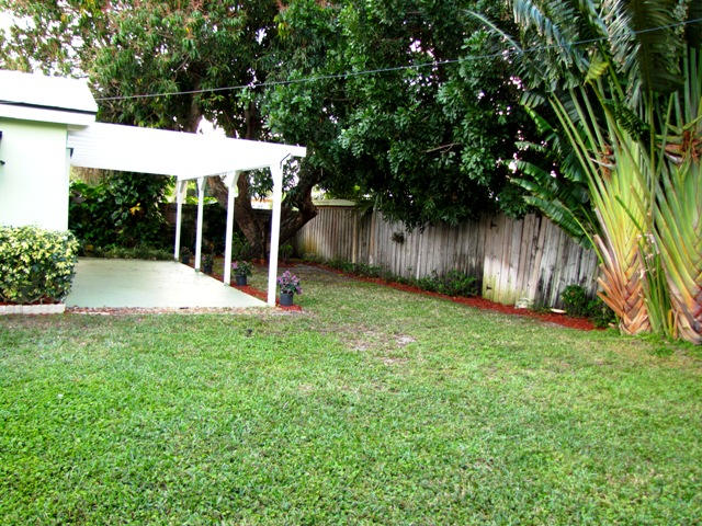 2145 Northeast 4th Way Boca Raton, FL 33431 - Photo 9 of 41 Back Yard with Trellis Covered Patio