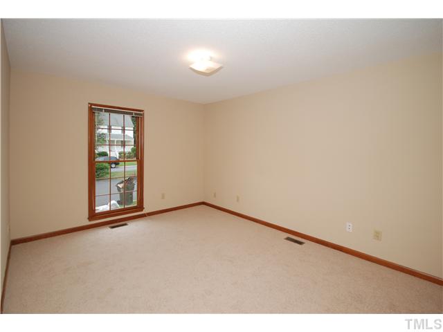 7200 Ewing Place Raleigh, NC 27616 - Photo 12 of 25 a view of an empty room with a window