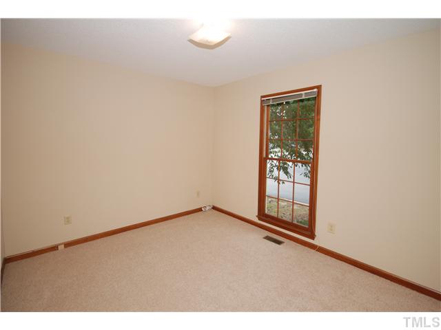 7200 Ewing Place Raleigh, NC 27616 - Photo 16 of 25 a view of an empty room with a window
