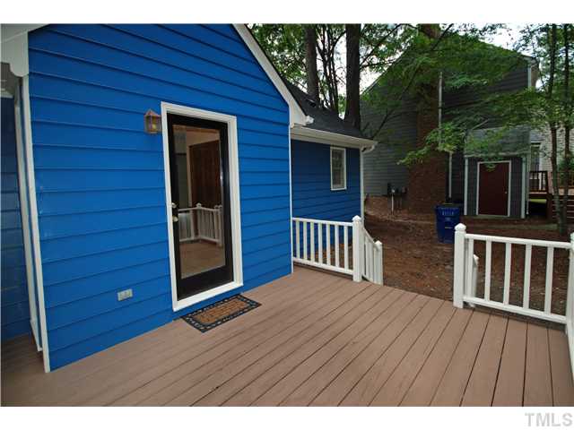 7200 Ewing Place Raleigh, NC 27616 - Photo 23 of 25 a view of backyard with a deck and wooden floor