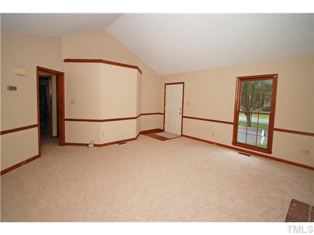 7200 Ewing Place Raleigh, NC 27616 - Photo 5 of 25 a view of an empty room with a window