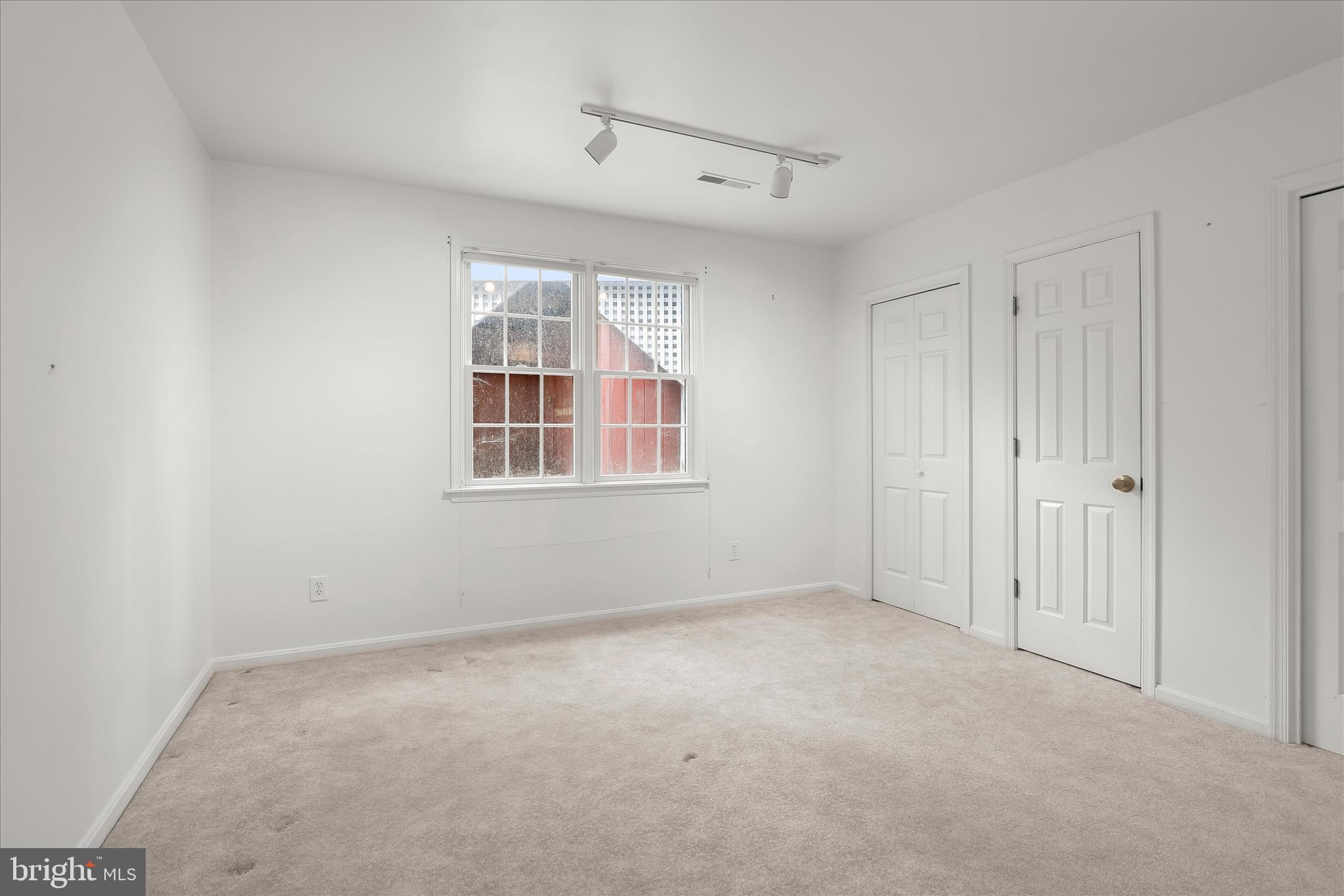 13612 Jacobs Road Mount Airy, MD 21771 - Photo 39 of 90 a view of an empty room with a window