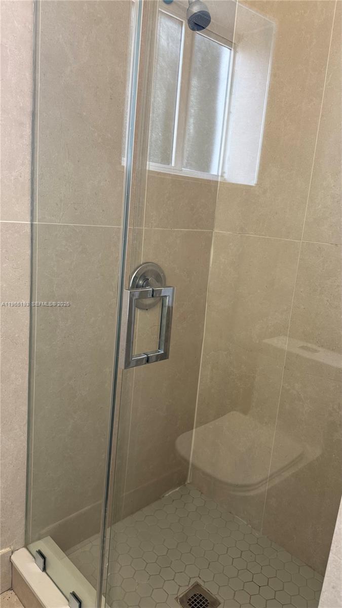 2238 Northwest 5th Street, Unit 1 Miami, FL 33125 - Photo 11 of 18 a bathroom with a shower