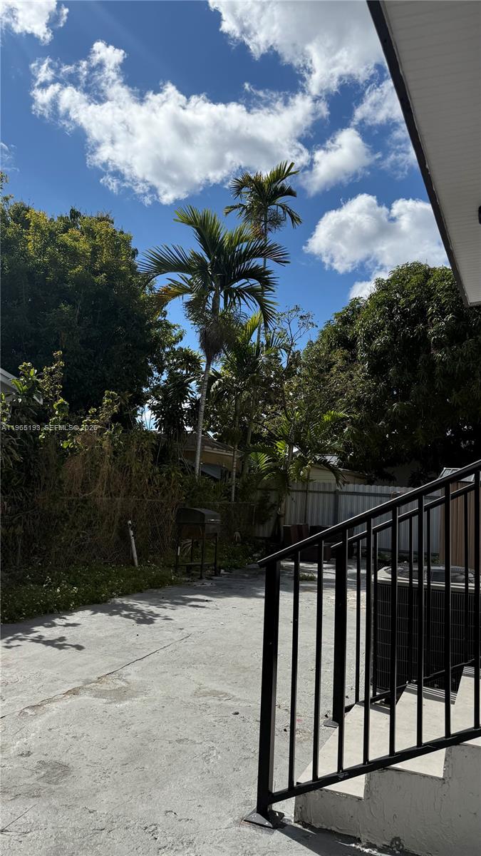 2238 Northwest 5th Street, Unit 1 Miami, FL 33125 - Photo 17 of 18 a view of balcony with furniture