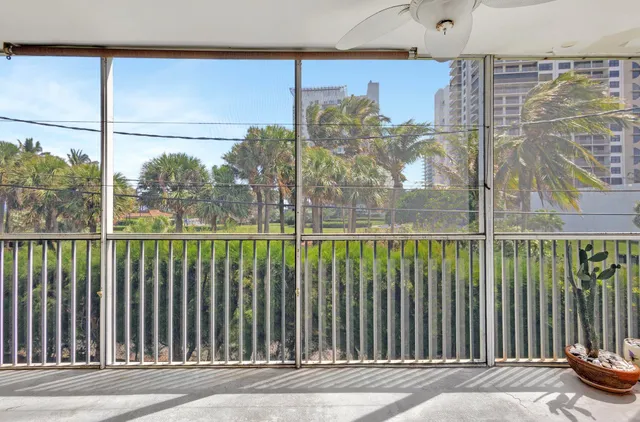 a view of a building from a balcony