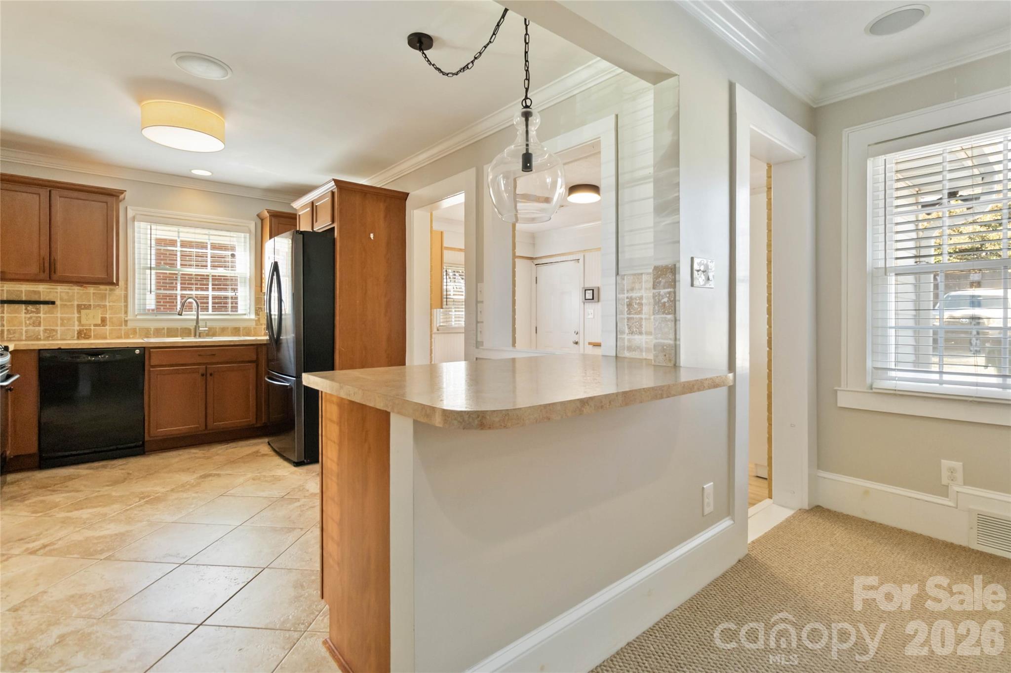 3750 Havenwood Road Charlotte, NC 28205 - Photo 13 of 37 a large bathroom with a large mirror vanity and a shower
