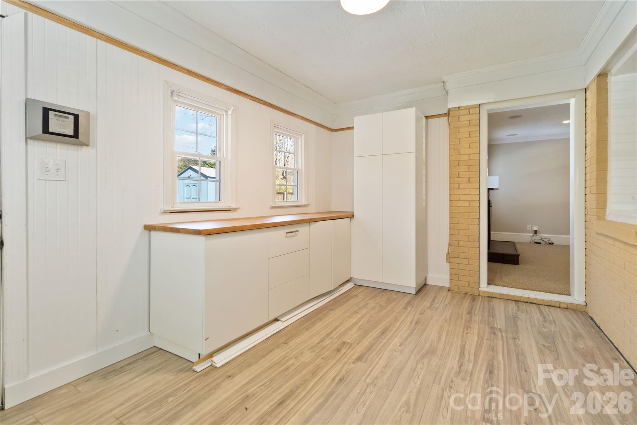 3750 Havenwood Road Charlotte, NC 28205 - Photo 21 of 37 a view of a room with wooden floor and a sink