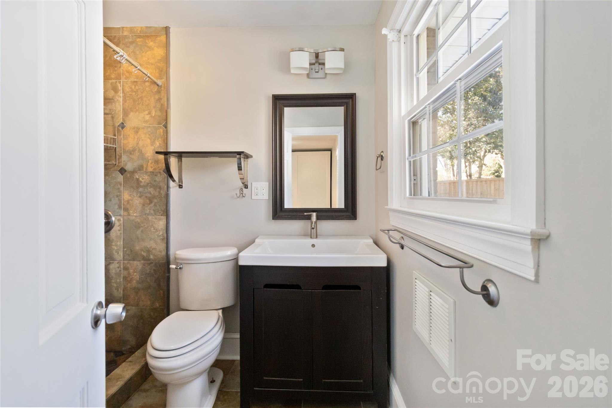 3750 Havenwood Road Charlotte, NC 28205 - Photo 33 of 37 a bathroom with a sink and a toilet