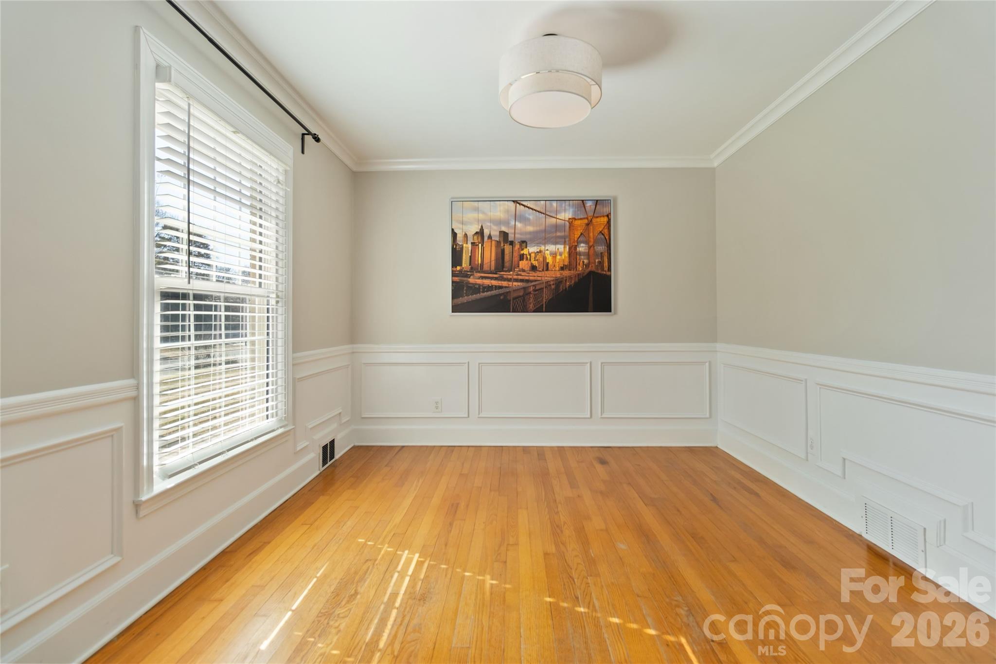 3750 Havenwood Road Charlotte, NC 28205 - Photo 7 of 37 a view of an empty room with a window