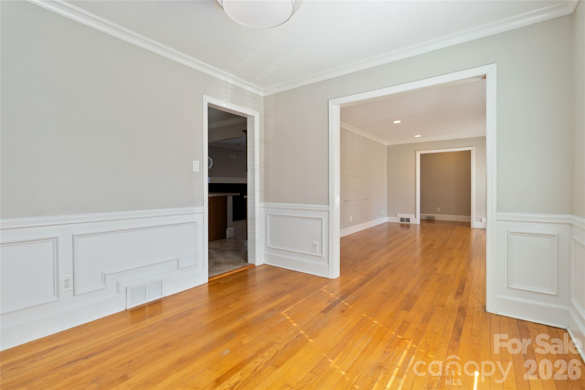 3750 Havenwood Road Charlotte, NC 28205 - Photo 8 of 37 a view of empty room with wooden floor