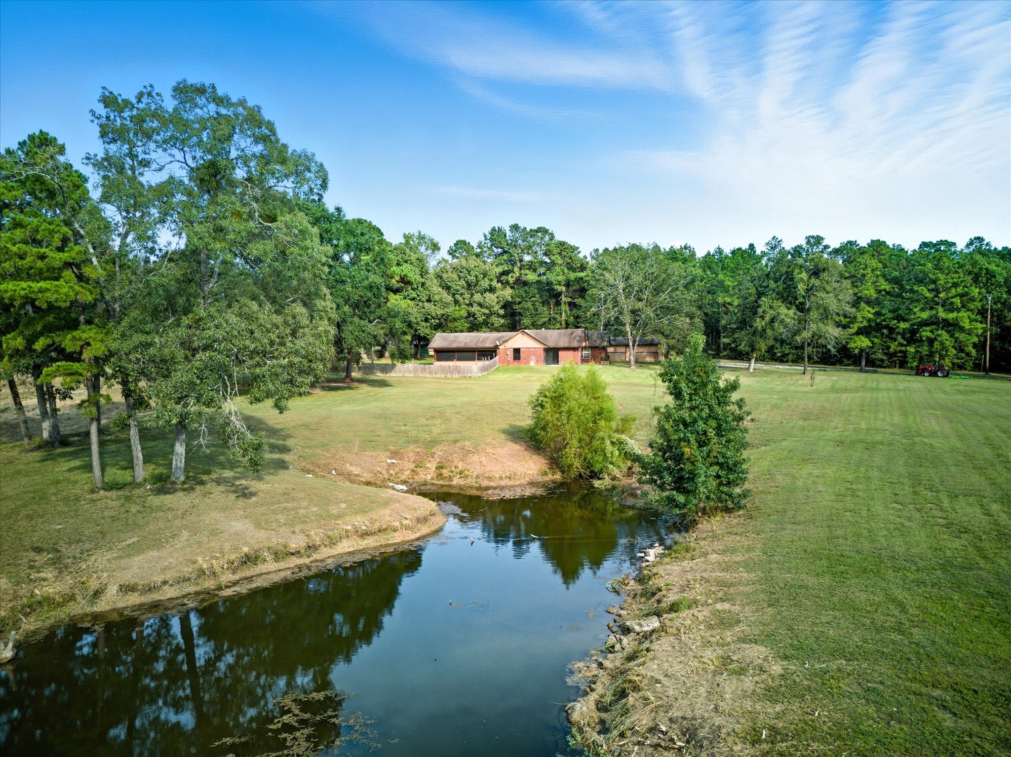 101 Merino Drive Huntsville, TX 77340 - Photo 41 of 42 Enjoy fishing in the stocked pond