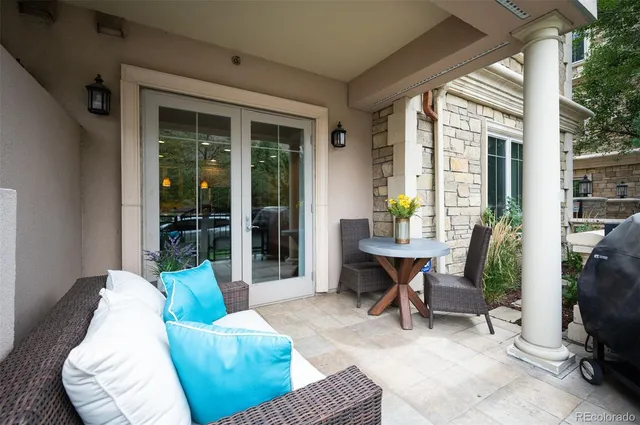 a view of parking garage with cars