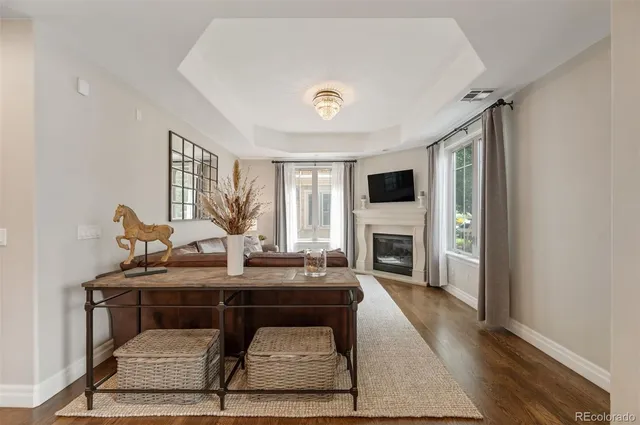 a living room with a couch and a fireplace