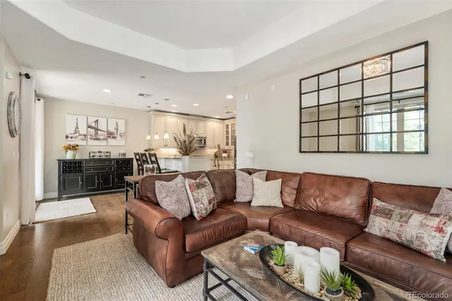 a view of a living room kitchen and a window