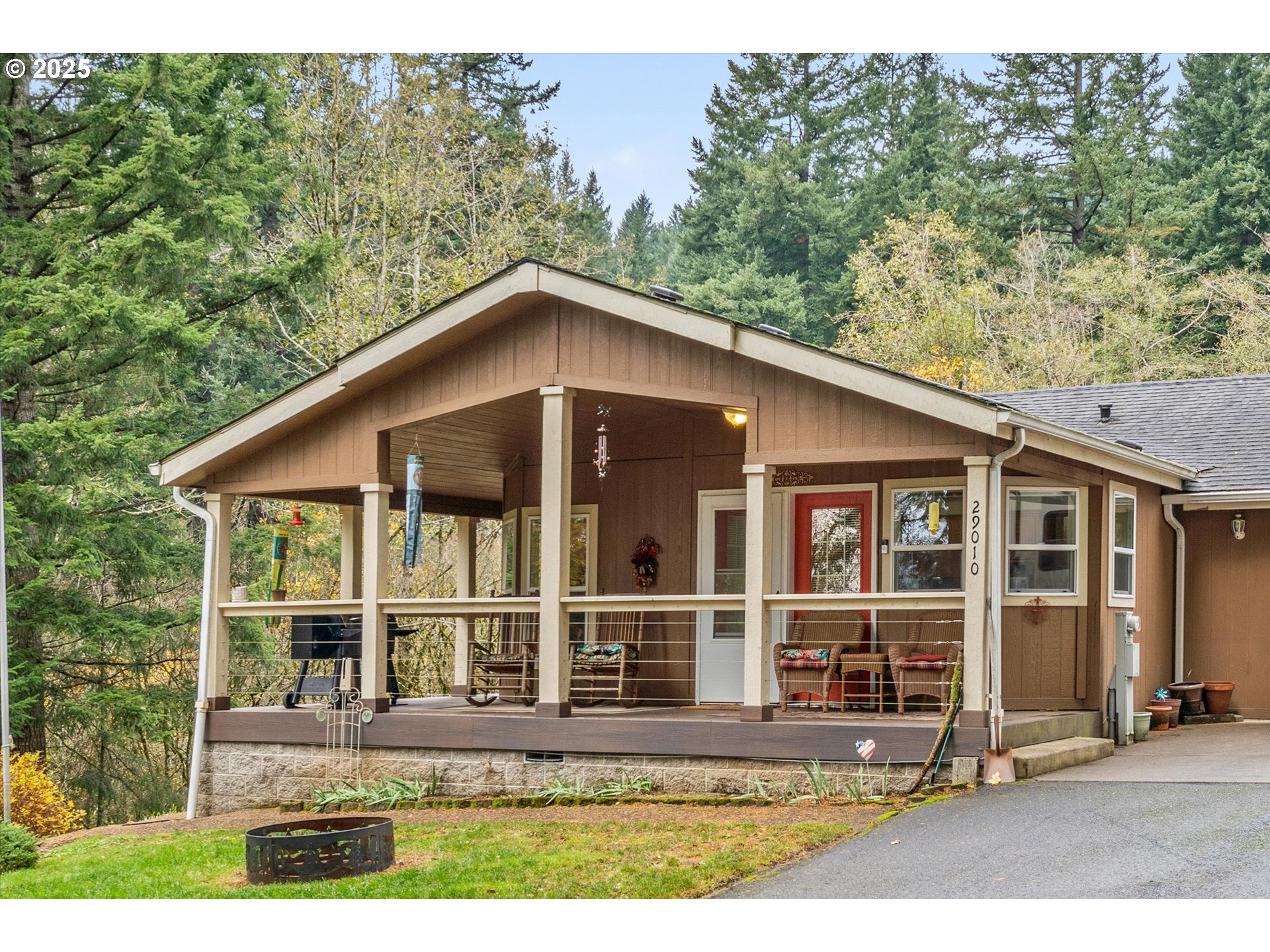 29010 Northeast 63rd Circle Camas, WA 98607 - Photo 3 of 30 a front view of a house with a yard