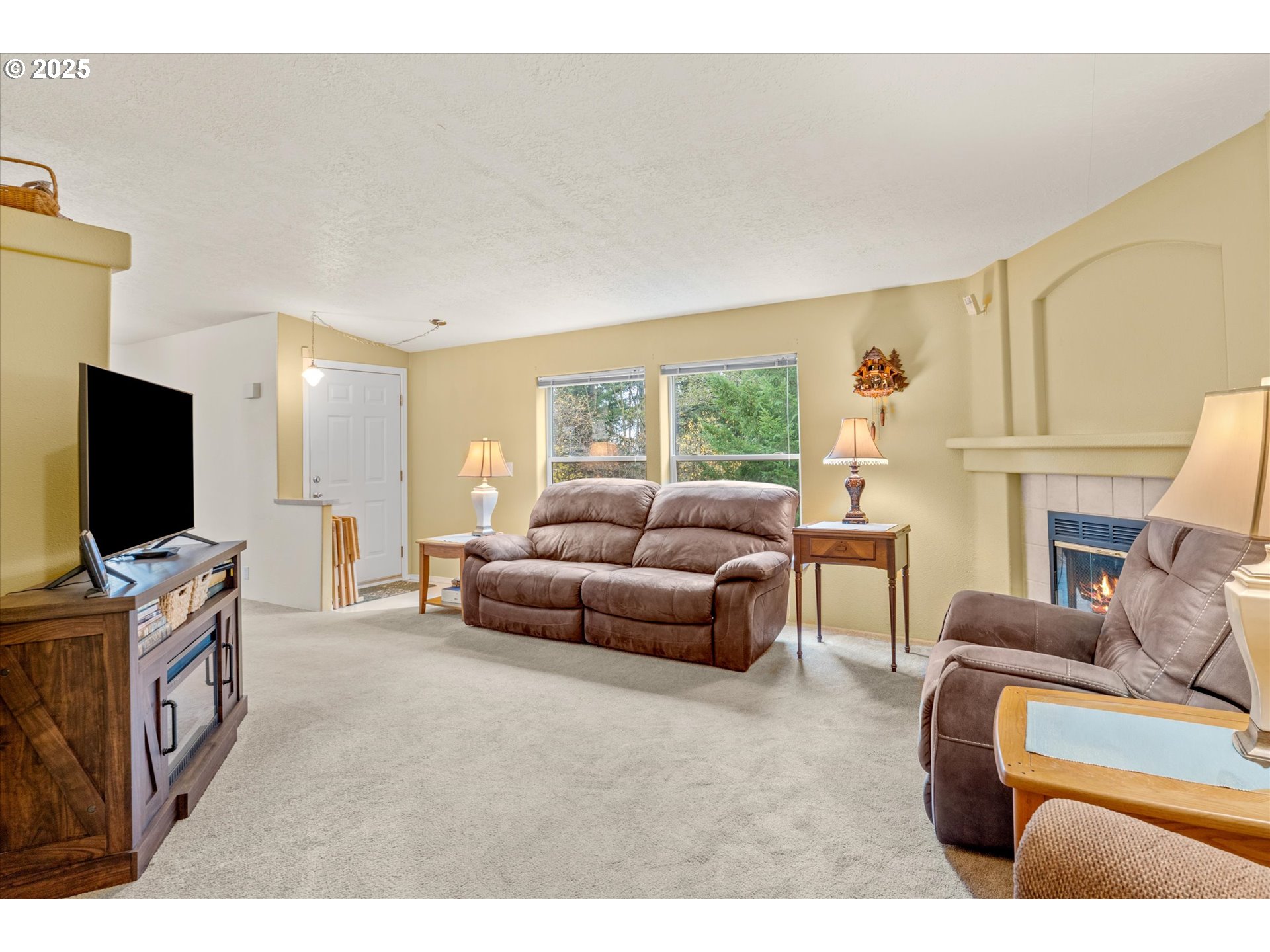 29010 Northeast 63rd Circle Camas, WA 98607 - Photo 10 of 30 a living room with furniture and a flat screen tv