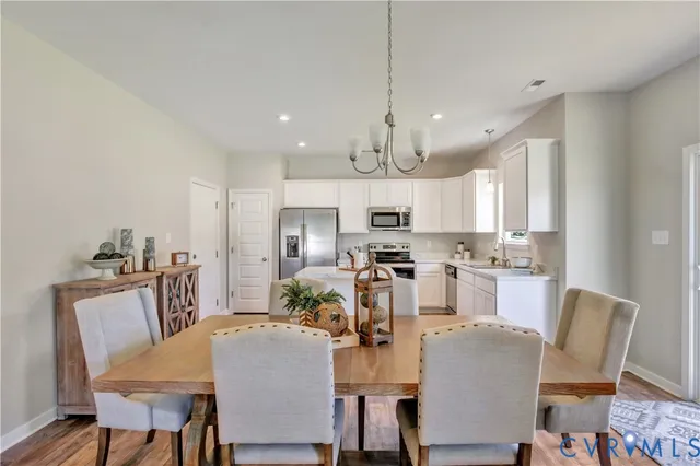 a view of a dining room with furniture