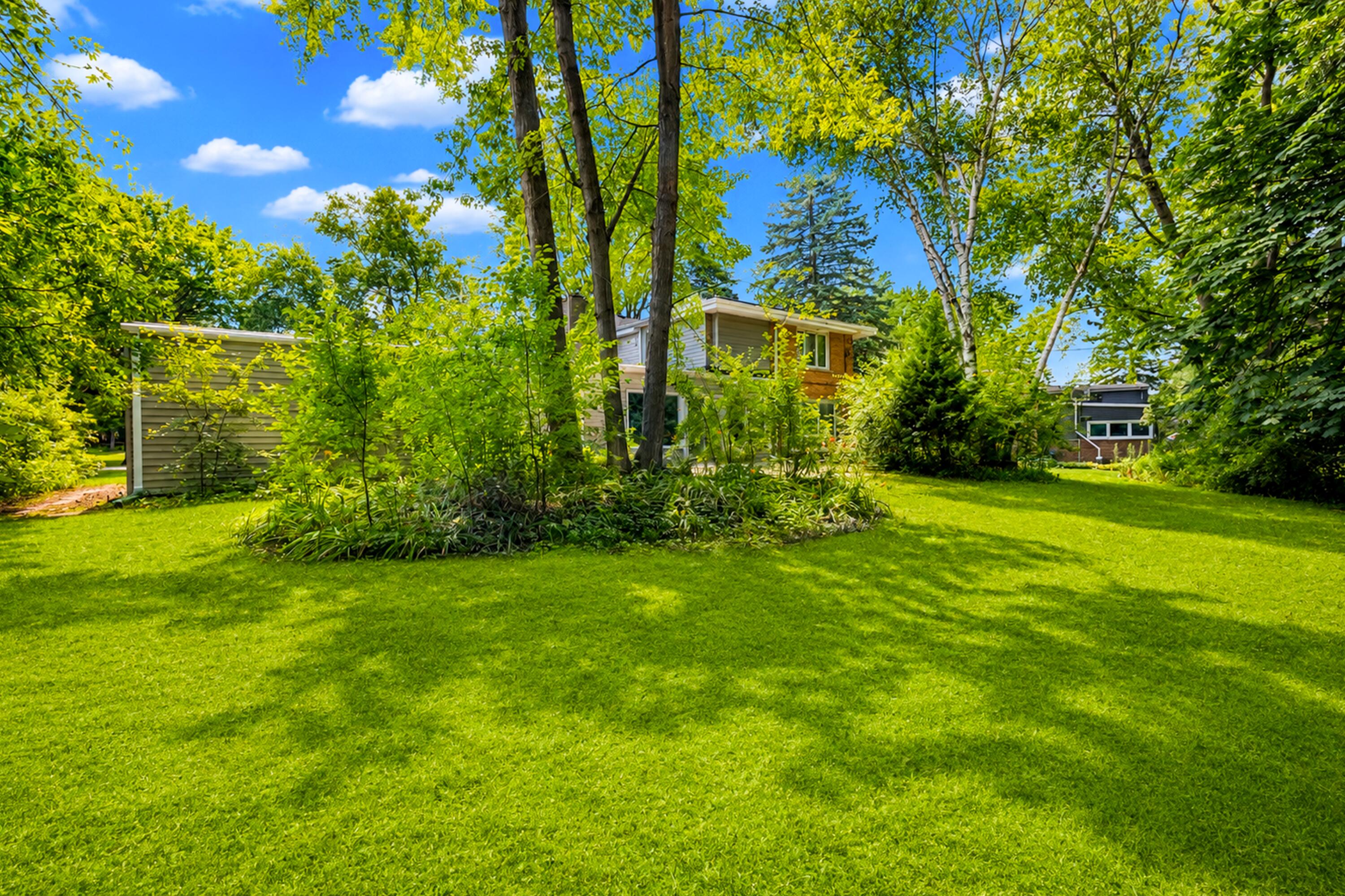 214 East Spooner Road Fox Point, WI 53217 - Photo 30 of 35 Lovely Backyard