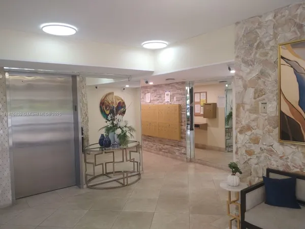 a dining room with furniture and a garden view