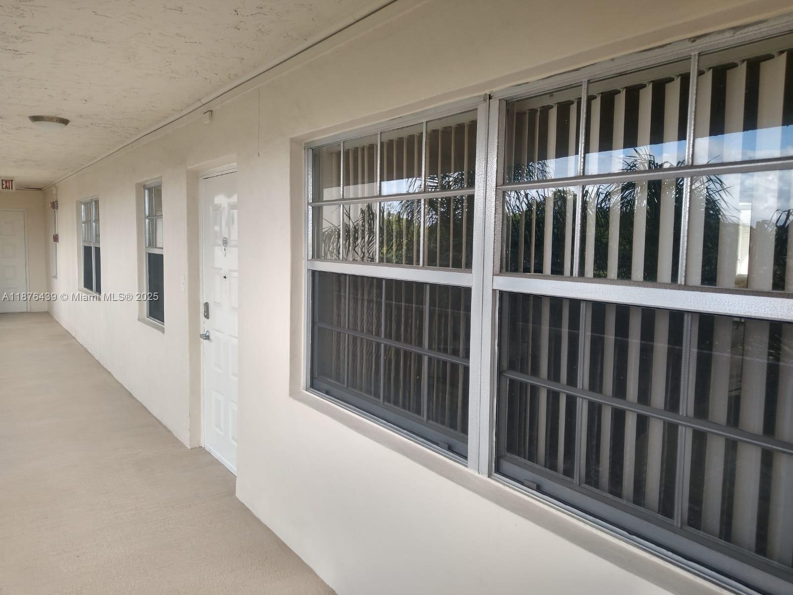 3510 Oaks Way, Unit 509 Pompano Beach, FL 33069 - Photo 11 of 36 a view of a balcony
