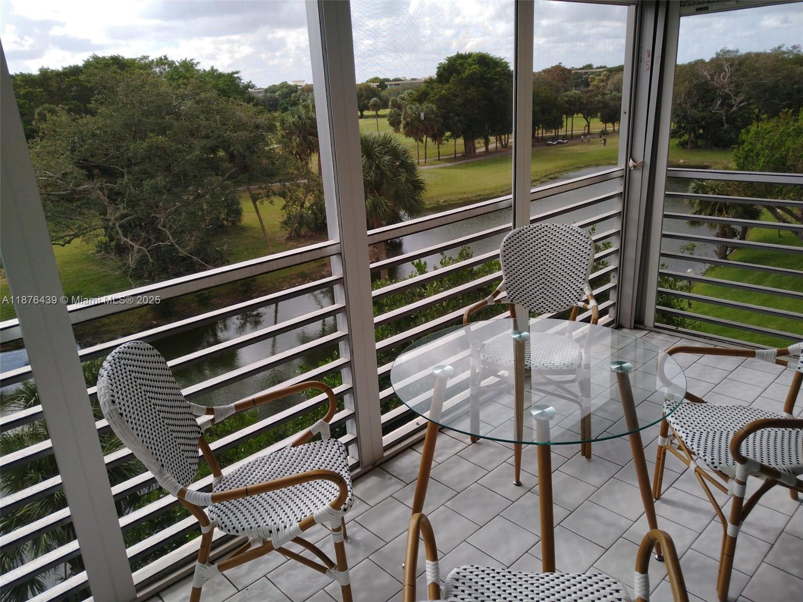 3510 Oaks Way, Unit 509 Pompano Beach, FL 33069 - Photo 27 of 36 a view of a chairs