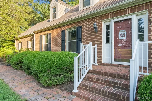 a front view of a house with a porch