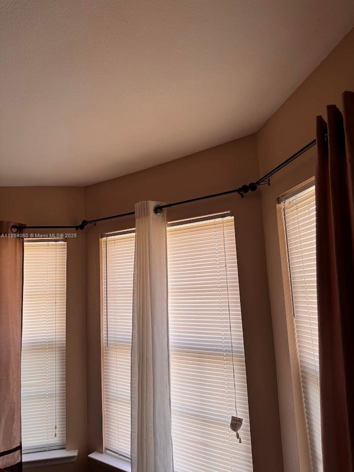 164 Deloris Madison Drive Midway, FL 32343 - Photo 11 of 41 a view of empty room with wooden floor and fan