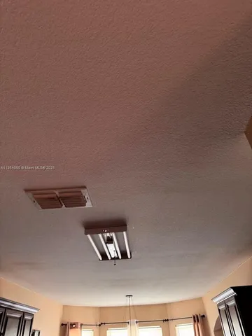 a bathroom with a shower and a mirror