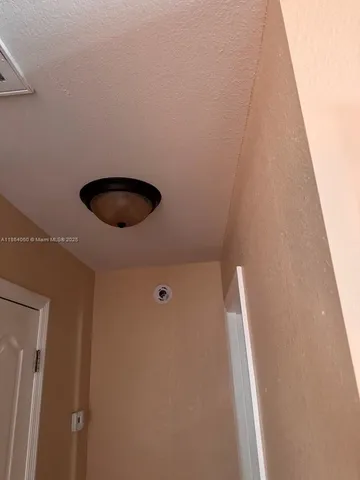 a view of small space with wooden floor