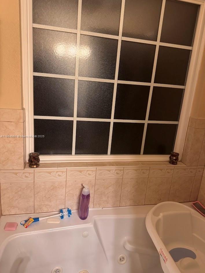 164 Deloris Madison Drive Midway, FL 32343 - Photo 31 of 41 a bathroom with a tub