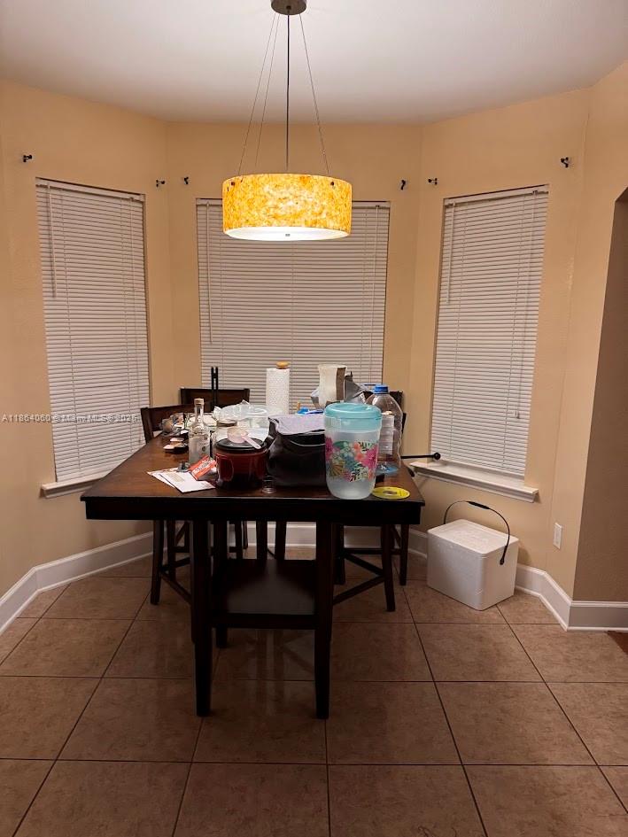 164 Deloris Madison Drive Midway, FL 32343 - Photo 33 of 41 a view of a dining room with furniture and chandelier