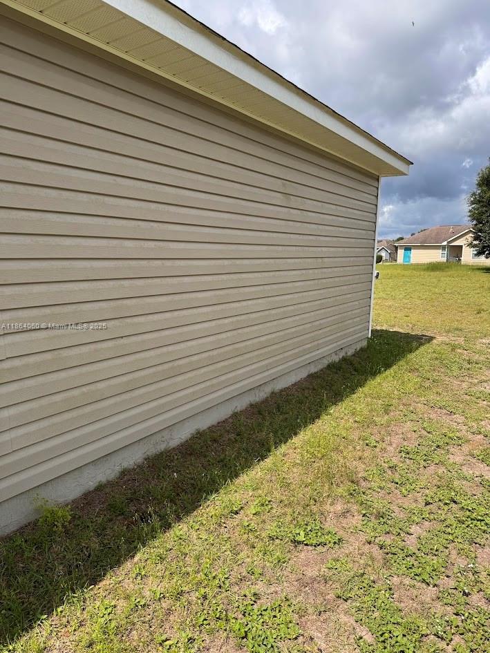 164 Deloris Madison Drive Midway, FL 32343 - Photo 36 of 41 a view of a backyard with plants and large trees