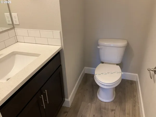a bathroom with a sink and a toilet