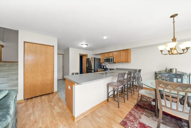 a view of a kitchen and dining room