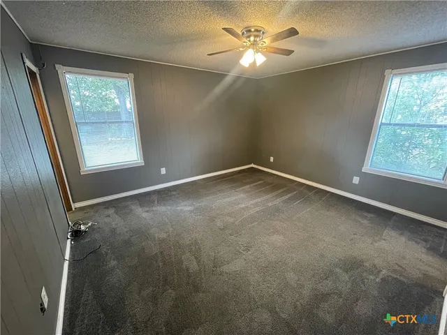 a view of a livingroom with furniture