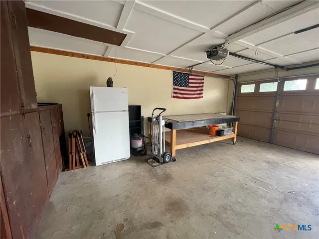 a view of a yard with an outdoor space