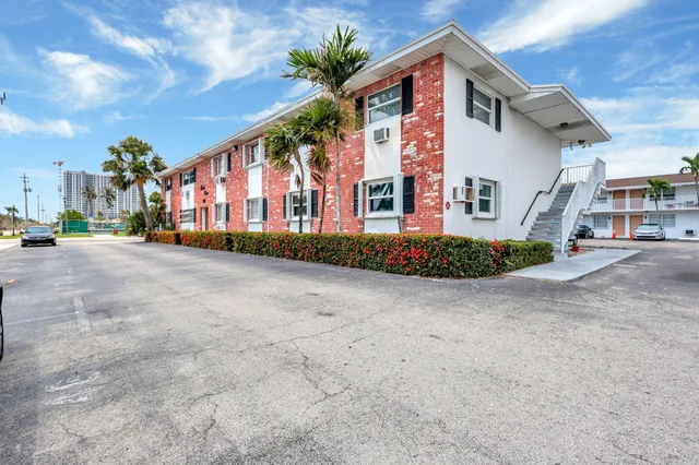 a front view of building with street