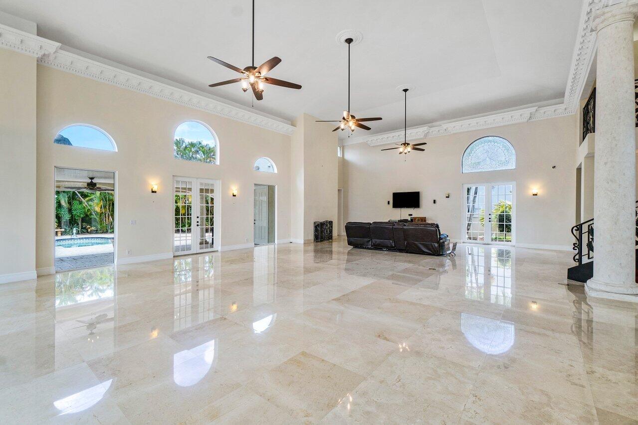 217 Thatch Palm Drive Boca Raton, FL 33432 - Photo 13 of 51 Expansive Family/Living Room