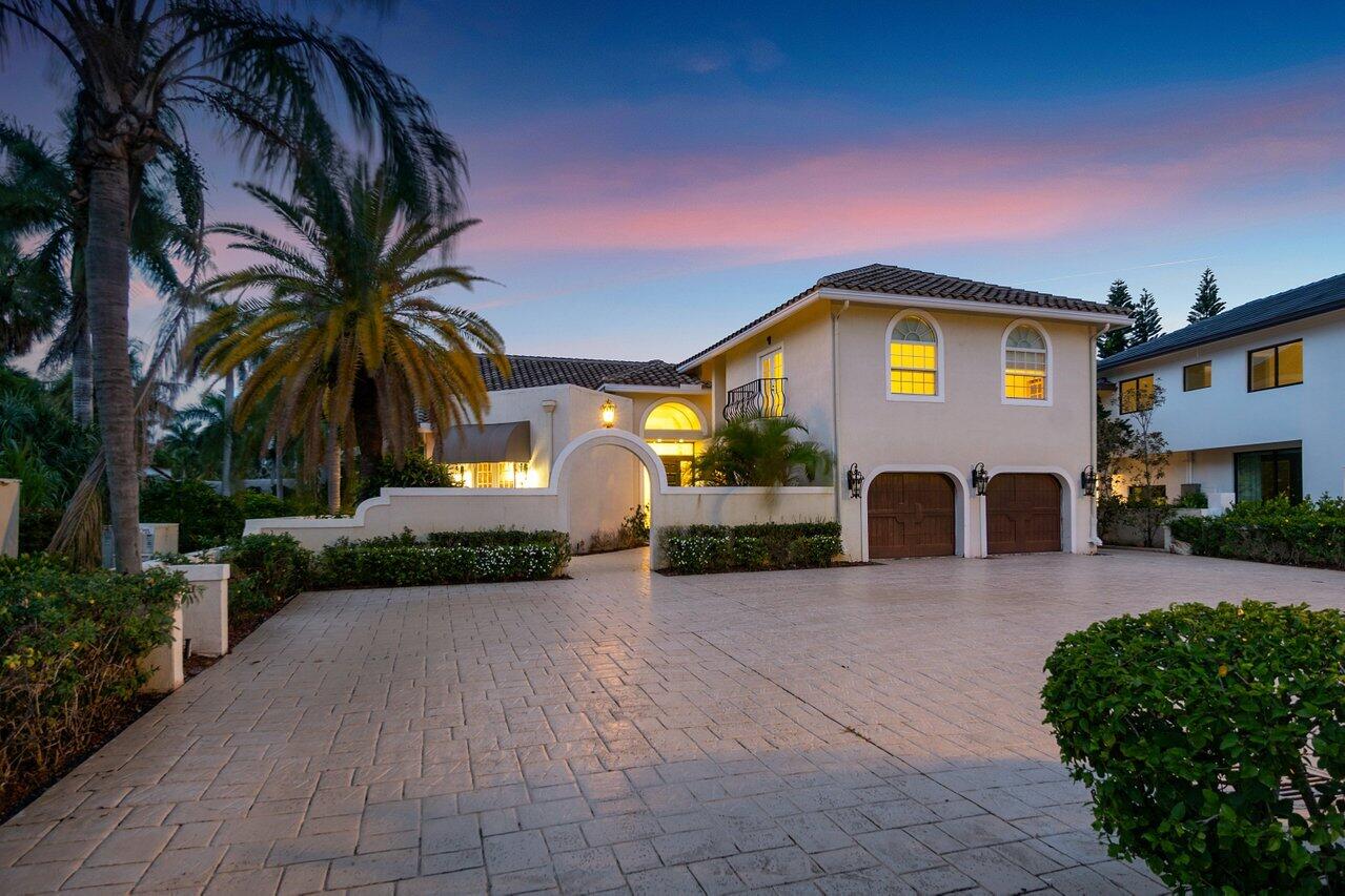 217 Thatch Palm Drive Boca Raton, FL 33432 - Photo 2 of 51 Twilight Front