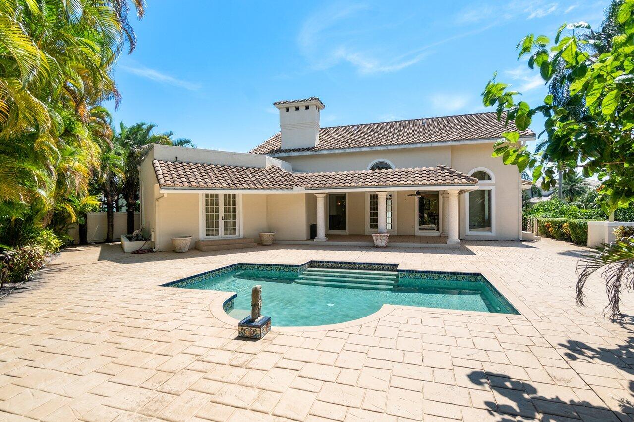 217 Thatch Palm Drive Boca Raton, FL 33432 - Photo 33 of 51 Pool & Outdoor Seating Area