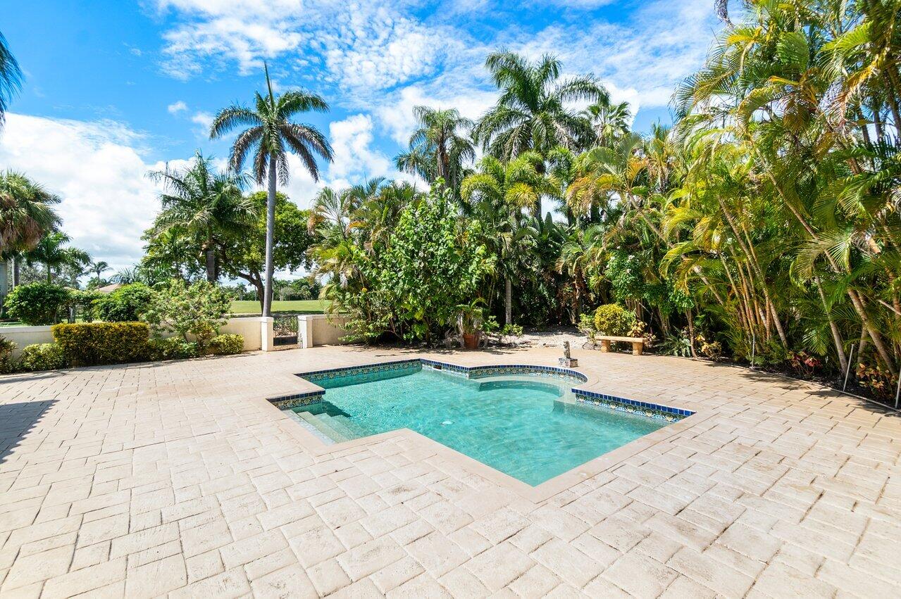 217 Thatch Palm Drive Boca Raton, FL 33432 - Photo 35 of 51 Pool & Outdoor Seating Area