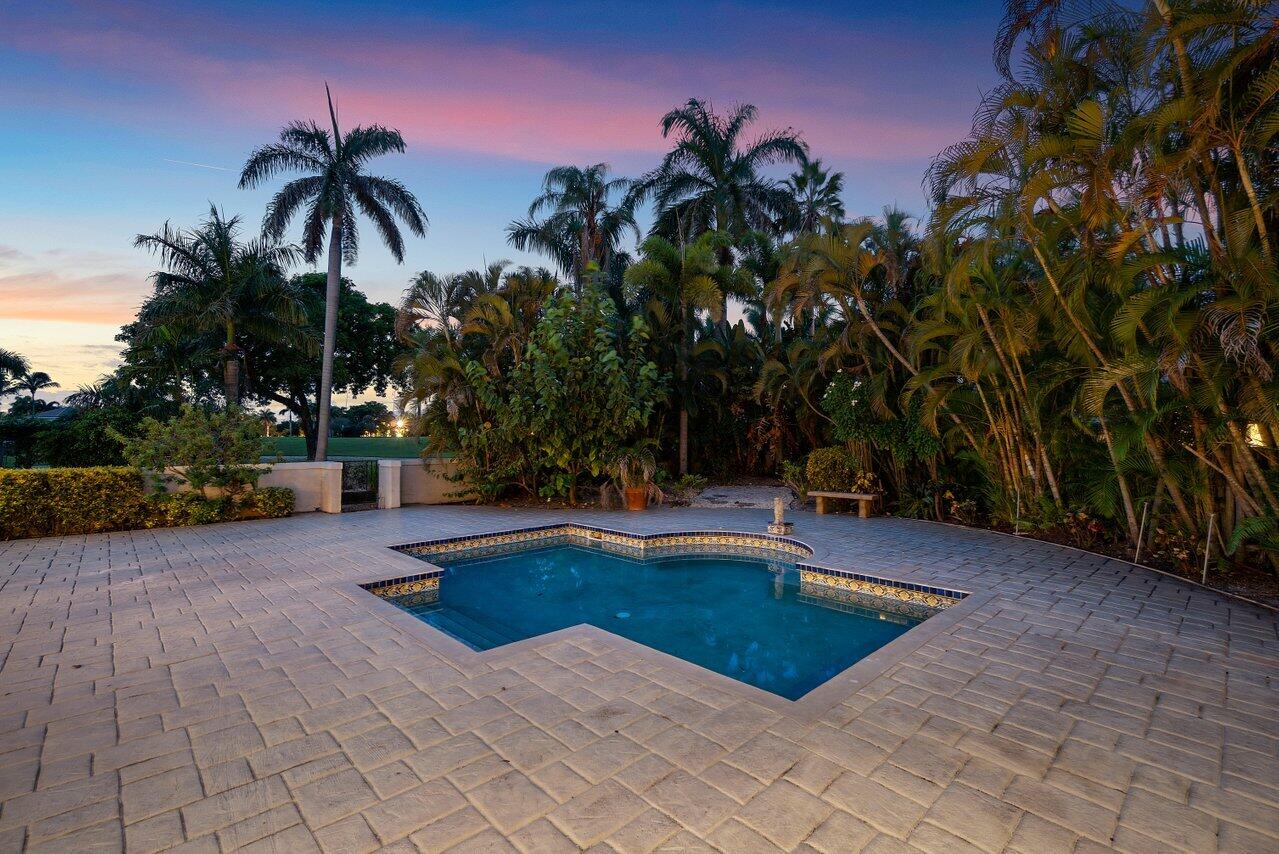 217 Thatch Palm Drive Boca Raton, FL 33432 - Photo 36 of 51 Twilight Pool