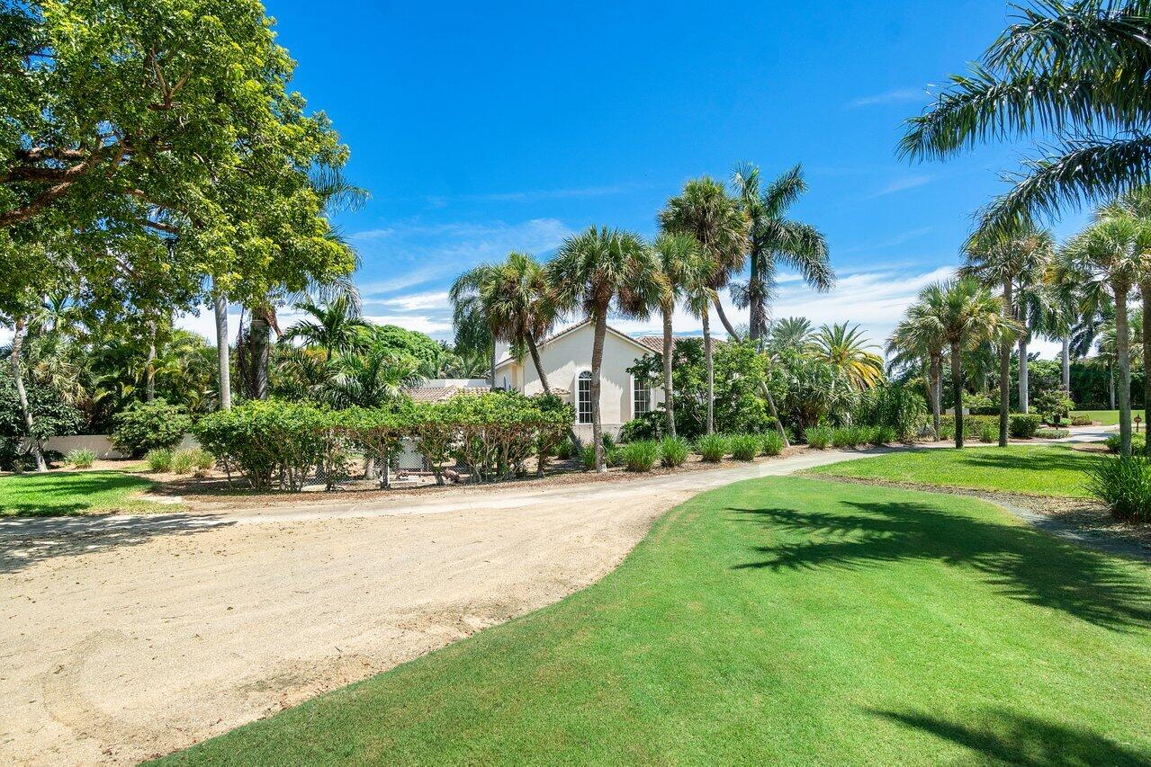 217 Thatch Palm Drive Boca Raton, FL 33432 - Photo 39 of 51 View of the Home from the Golf Course