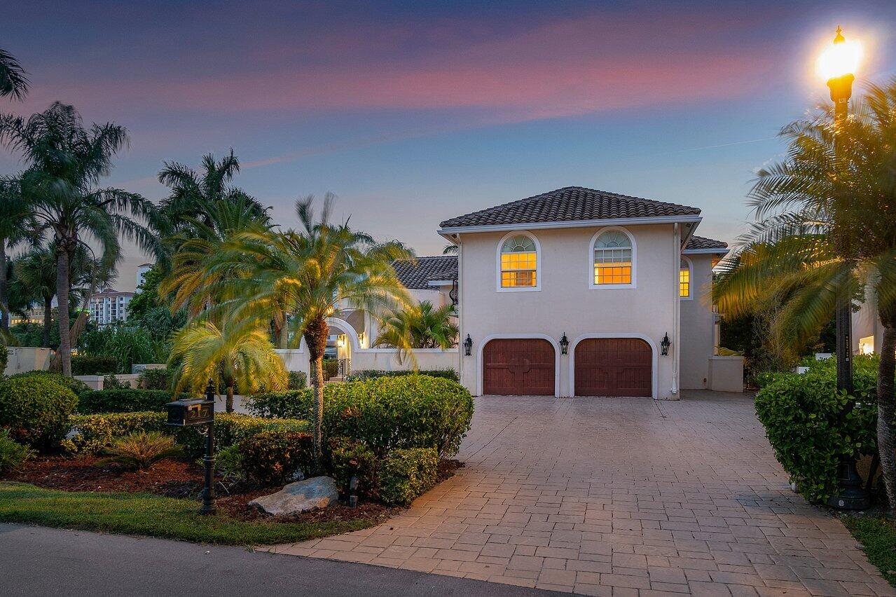 217 Thatch Palm Drive Boca Raton, FL 33432 - Photo 44 of 51 Twilight Front