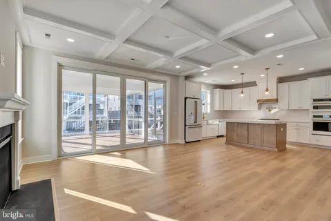 a view of a living room with a large window