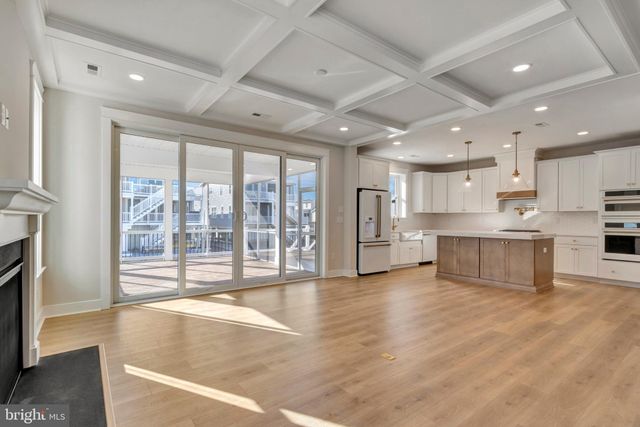 a view of a living room with a large window