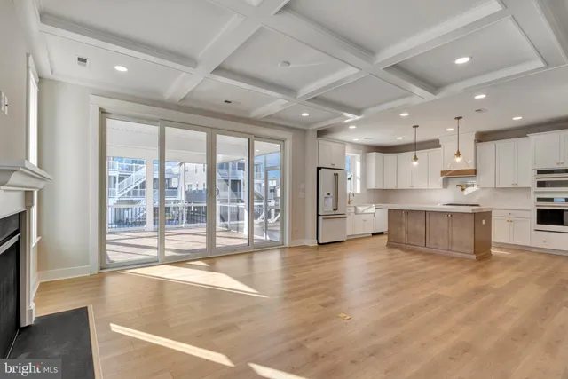 a view of a living room with a large window