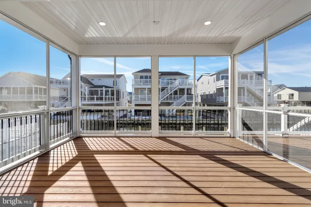 a kitchen with a sink a stove and cabinets