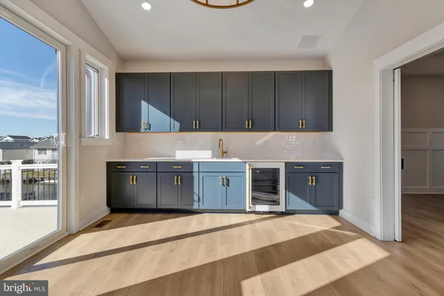 a view of a kitchen with a refrigerator