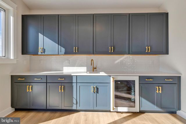 a close view of a sink and a window